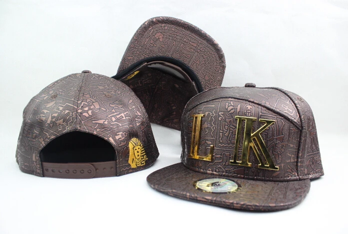 tyga gold hat