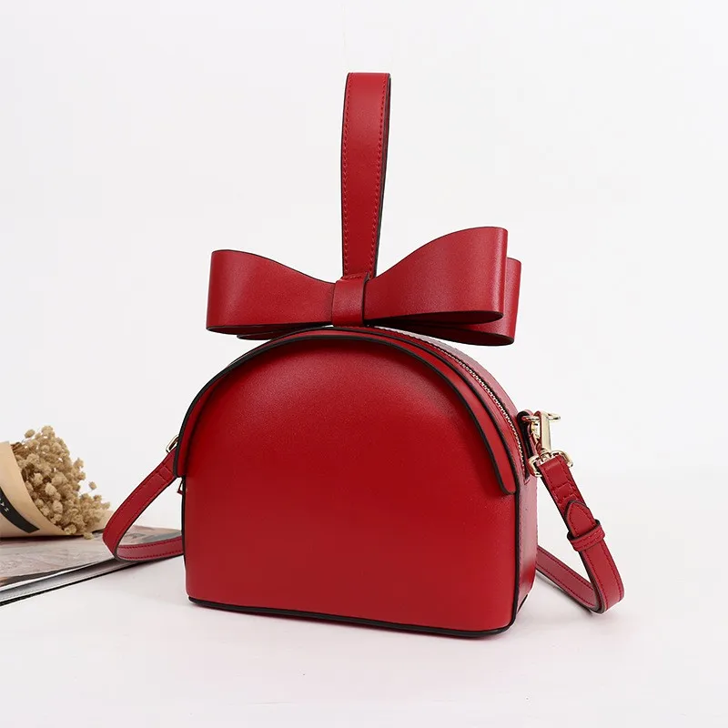 

Bag female 2018 new leather simple Messenger bag bow handbag Korean fashion wild trend leather