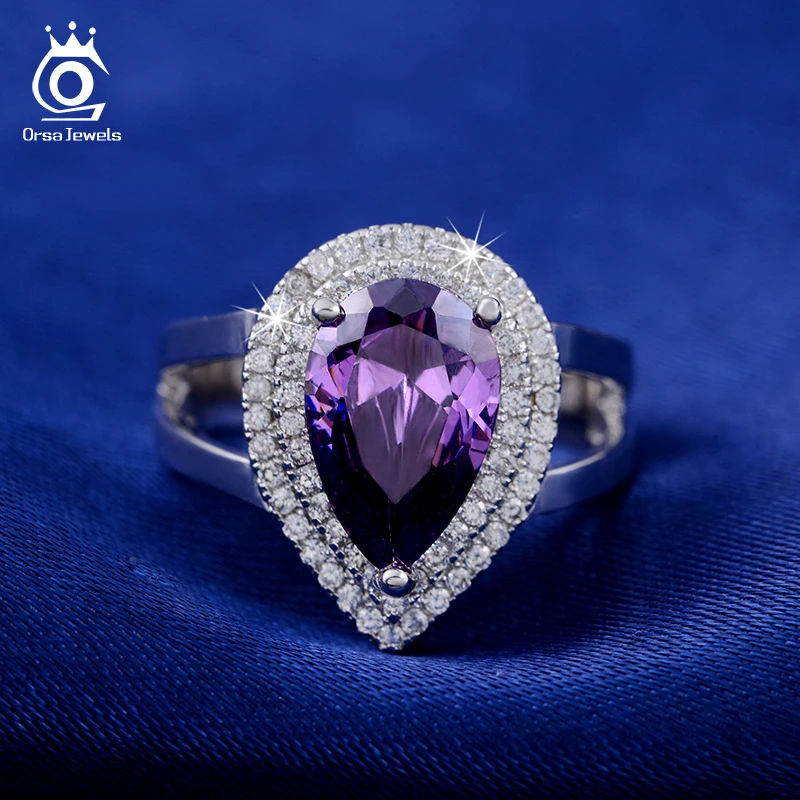 ORSA JEWELS Big Water Drop 6 ct Zircon Ring 3 Prong Setting with Micro Paved CZ Stone Around Trendy Party Rings for Women OR36