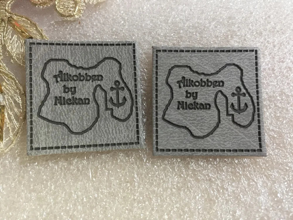 

Custom made leather label, PU leather label, PU patch , debossed / embossed logo leather tags for clothes, jeans,bags