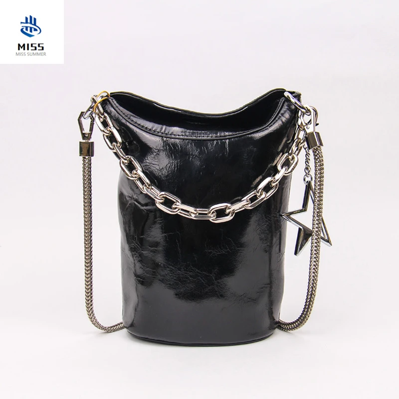 

2019 Fashion design cowhide leather handbag Korean version the luxury shoulder diagonal package Metal cowhide chain Bucket bag