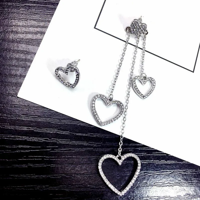 

Korean Version Of The New Fashion Earrings Personality Temperament Asymmetric Temperament Chain Love Earrings Ladies Wholesale