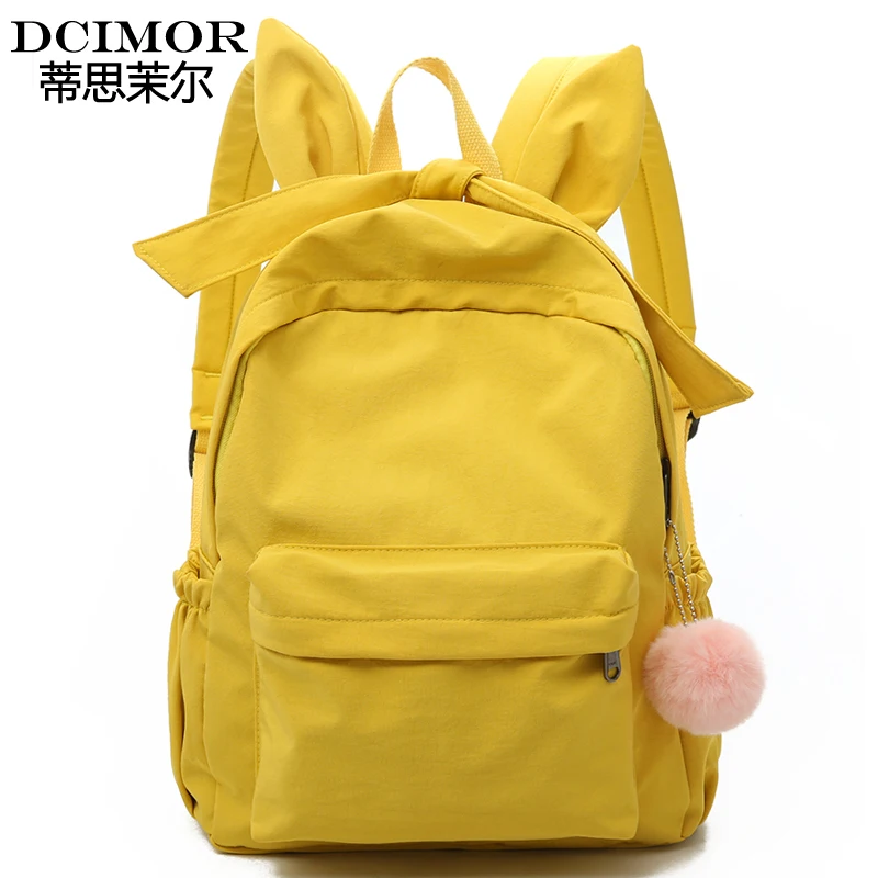 

DCIMOR Cute rabbit ears Nylon Backpack female backpack design for girls leisure travel backpacks Handle mochilas Women Backpack