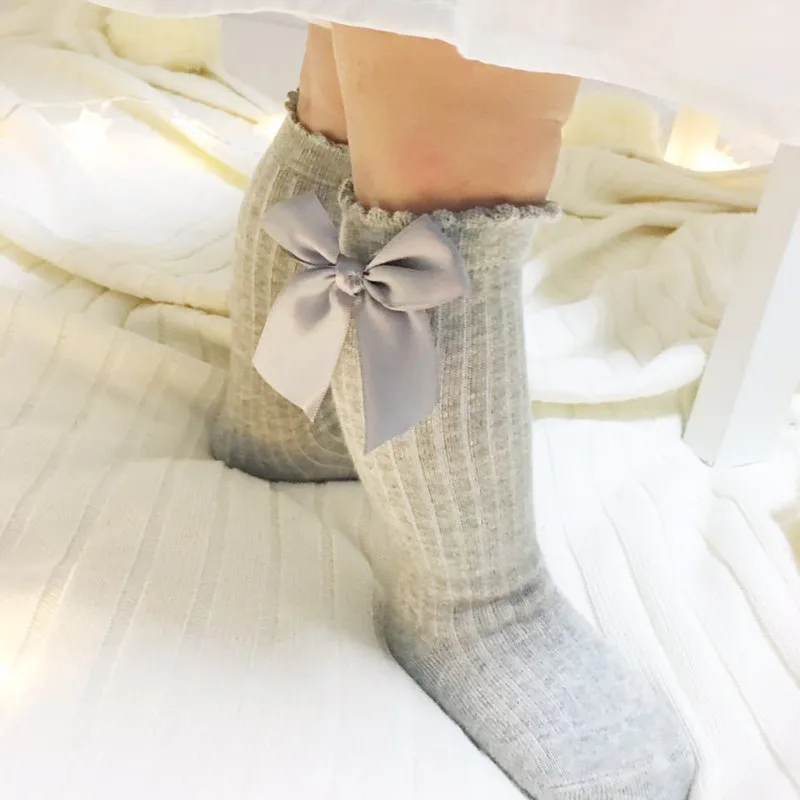

New Spring And Autumn Cute Cotton Baby Girl Socks Infant Toddler Princess Lovely Knee Socks Solid Bowknot Mid-calf Length Sock