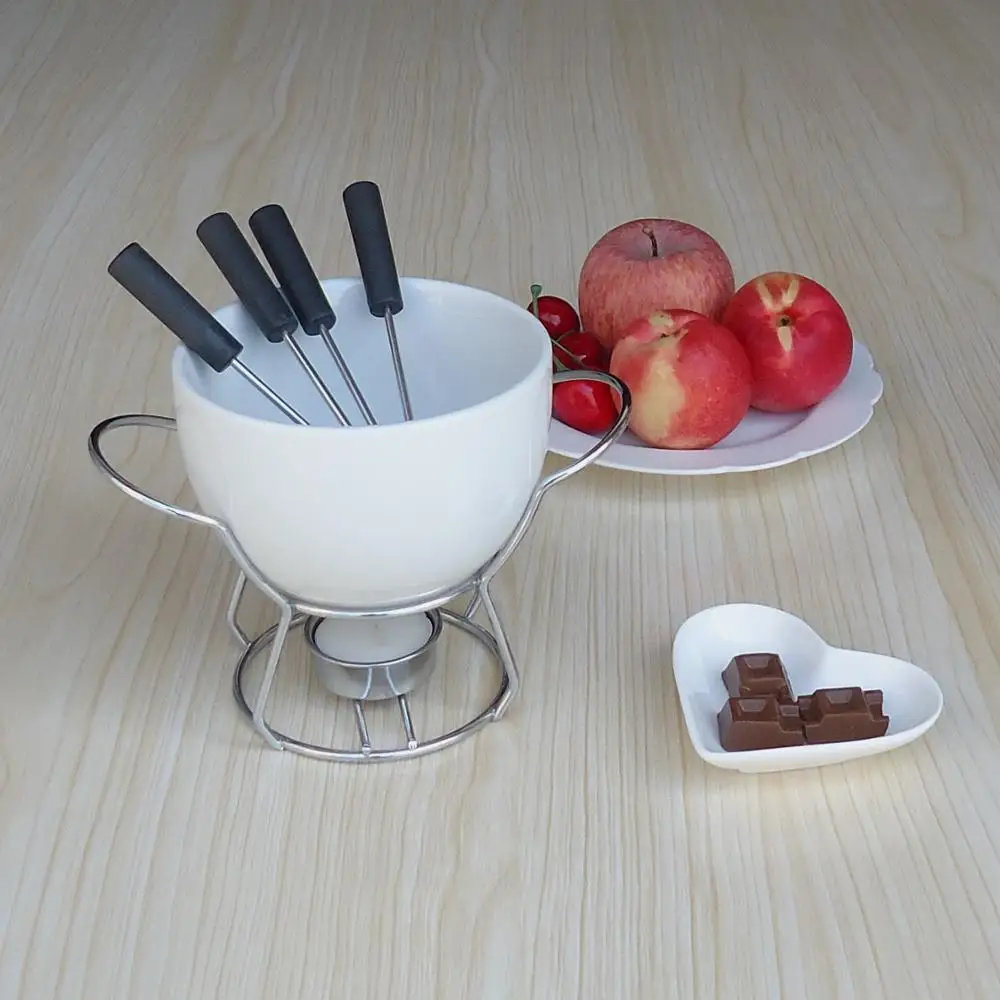 

Ceramic fondue set cheese warmer chocolate pot on a metal stand