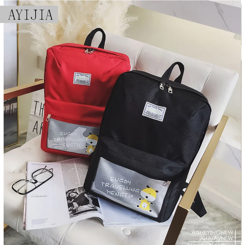 

2018 new fashion men and women casual backpack USB interface charging backpack student candy color bag college student computer