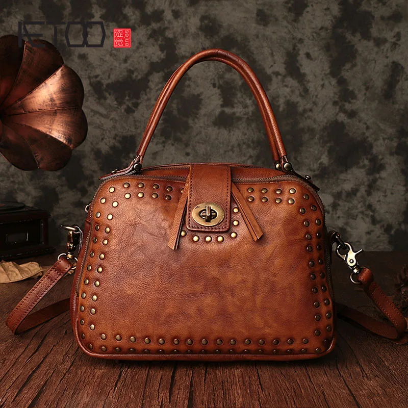 

EUMOAN 2017 autumn and winter new handbags fashion vintage color grafting mix leather rivets hand-held diagonal package