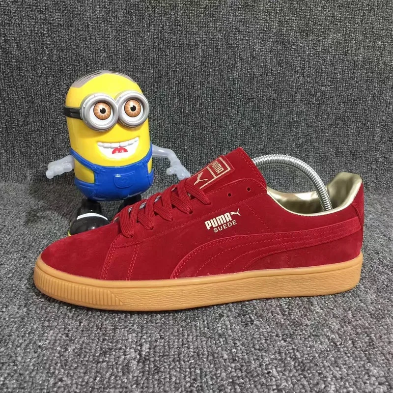 black and yellow puma shoes