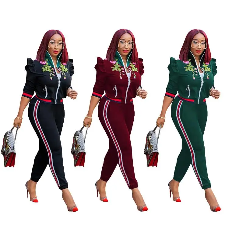 

2018 autumn and winter new style, fashionable stand collar lotus leaf sleeve embroidery belt leisure suit two pieces