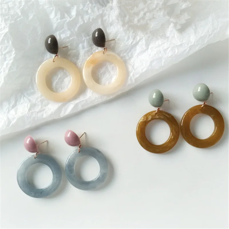 

Women acrylic stud earrings Contracted bump color resin circle earrings character joker girl students stud earrings for women