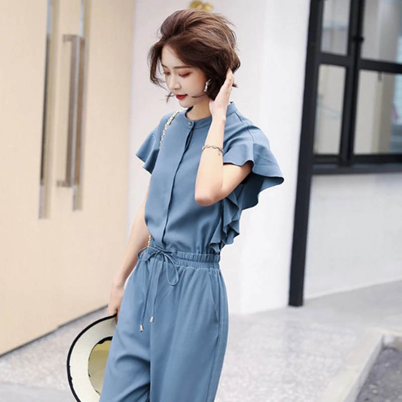 Lotus Sleeve Jumpsuit Women 2015 Spring And Summer New European Style One Piece Pants Female Elegant High Waist Trousers Lotus Sleeve Jumpsuit Women 2015 Spring And Summer New European Style One Piece Pants Female Elegant High Waist Trousers