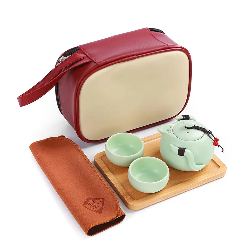 XING KILO Travel tea set portable bag home kung fu ceramic teapot fast customer a pot two or two cups gift custom logo XING KILO Travel tea set portable bag home kung fu ceramic teapot fast customer a pot two or two cups gift custom logo