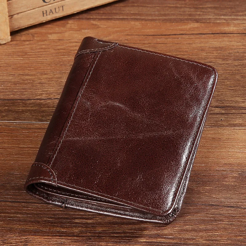 

2017 winter new first layer of leather men's wallet leather wallet short paragraph fold wallet Casual oil wax leather wallet