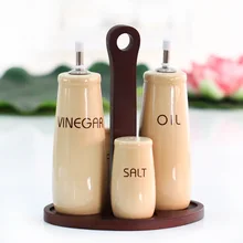 four-piece oil and vinegar bottles ceramic seasoning bottle set with wooden base herb and spice tools cooking tool