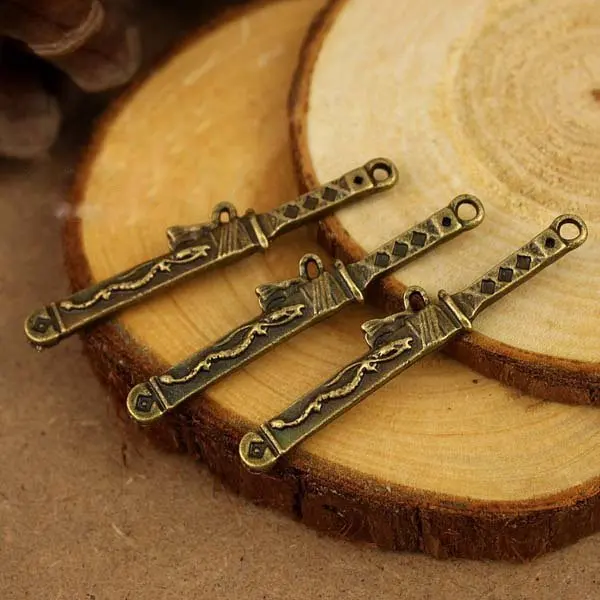 

Free shipping!!!bronze Tone Samurai Sword Charm Pendants 42x6mm fit necklace