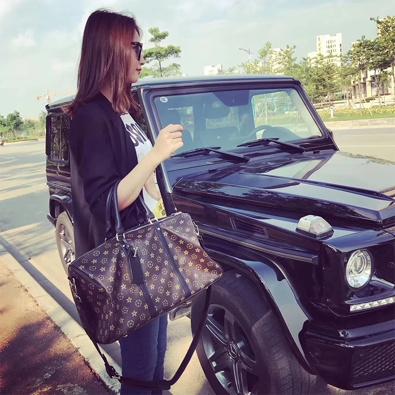 

Luxury Fashion Travel bag quality PU hand luggage bag carry on suitcase women men travel boarding valise new popular brand bag