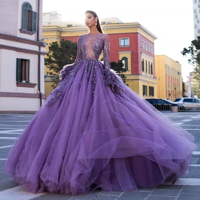 

2019 Fashion Purple Puffy Tutu Ball Gowns Appliques Beaded Feather Luxury Long Prom Gowns See Thru Full Sleeves