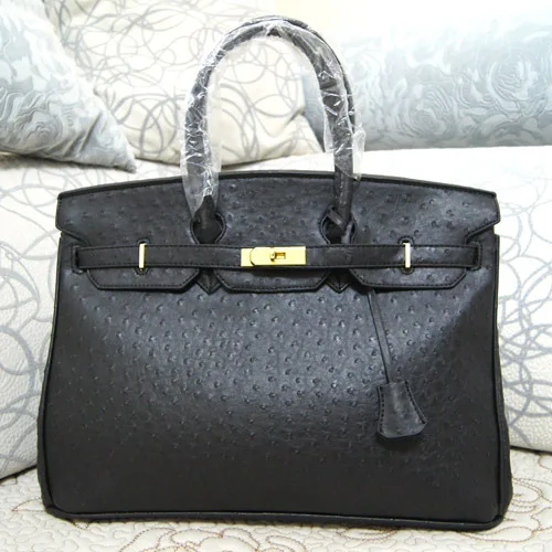 Sac à main avec cadenas marque Clearance