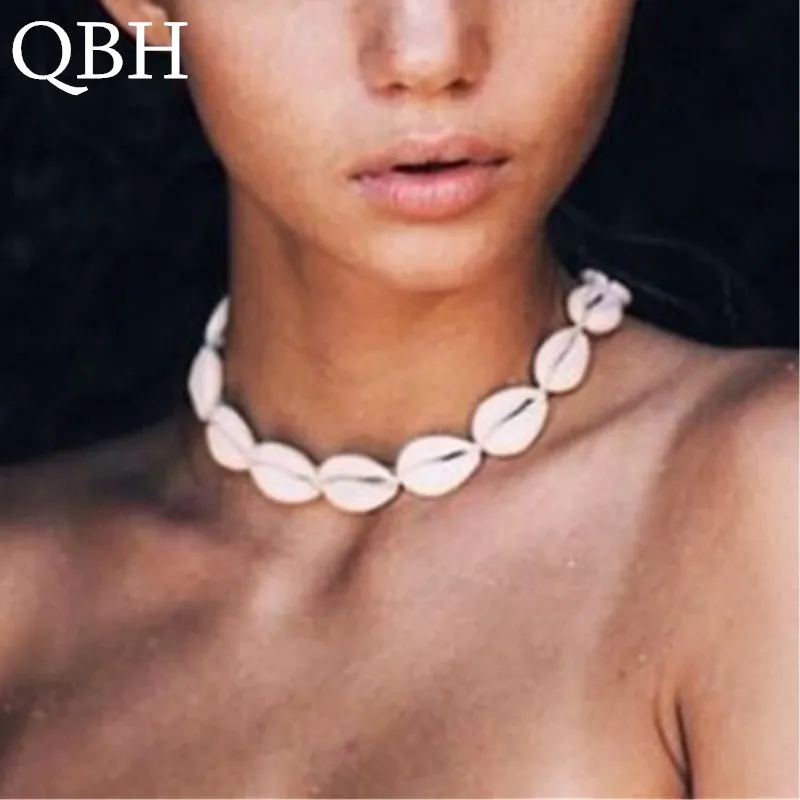 NK142 بوهيميا بوهو البحر Cowrie شل المختنق قلادة النساء حبل الطبيعي شل مجوهرات الشاطئ Chocker بسيطة Neckless للفتيات NK142 بوهيميا بوهو البحر Cowrie شل المختنق قلادة النساء حبل الطبيعي شل مجوهرات الشاطئ Chocker بسيطة Neckless للفتيات