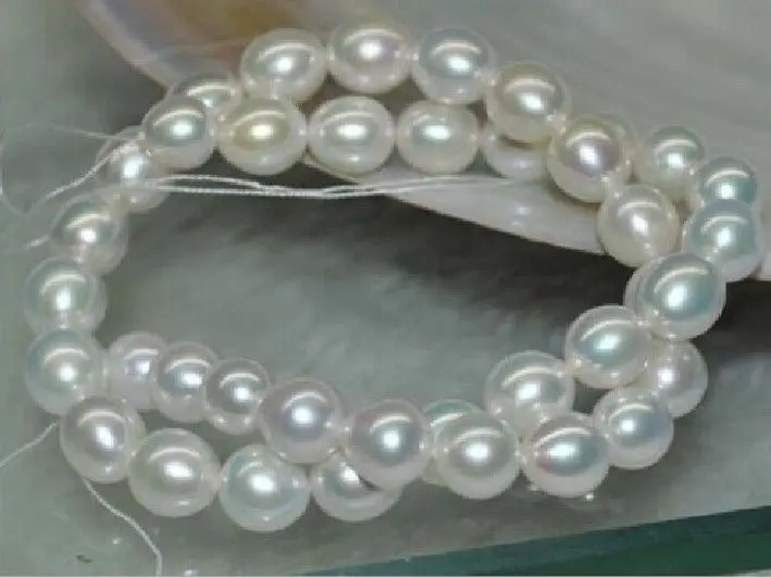 

Wholesale FREE SHIPPING 11-13 MM classic natural south sea AAA white pearl necklace 18" 14KGP