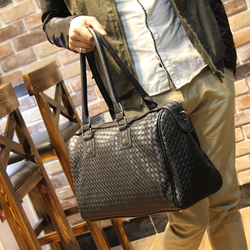 

Tidog Pure manual weaving han edition of the new male travel bag