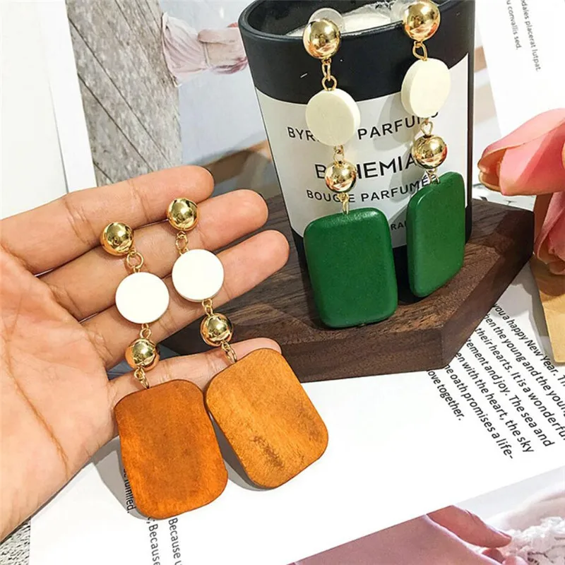 

Retro geometric wooden earrings Korean version of simple temperament long style wooden ear stud personality trend earrings