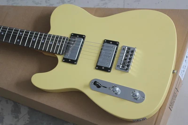 

Factory Wholesale Left-hand Milk-yellow String-thru-body Electric Guitar with 2H Pickups,Fixed Bridge,Offer Customized