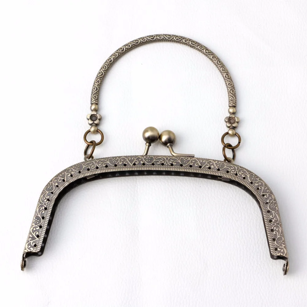 

JAVRICK 1PC Hot Selling Bronze Tone Arch Flower Metal Purse Bag Frame Kiss Clasp Lock with Handle 3T1421