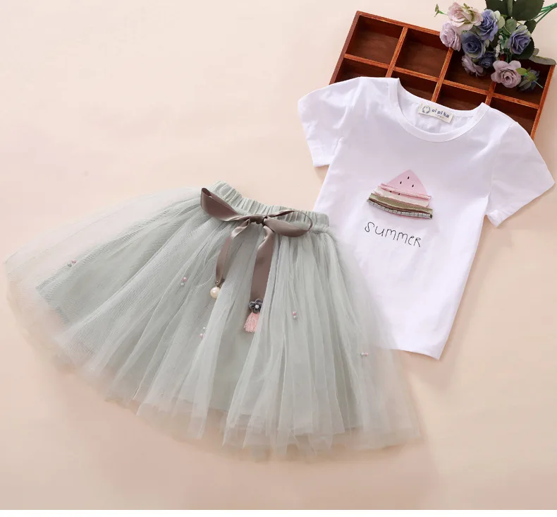 Conjuntos de Roupas Meninas de Verão Moda de Algodão de Manga Tees + Malha Curta Tops Saia Pcs Terno Crianças Roupas Casuais Dq942 2020 2 4 High Quality Mamãe e Bebê