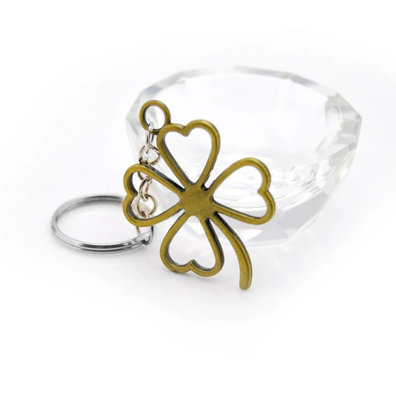 

New Fashion Lucky Four Leaves Clover Key Chains Bag Buckle Pendant For Car Keyrings KeyChains Women Jewelry Men Original Gift