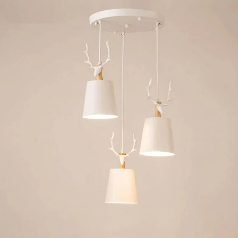 

Nordic restaurant chandelier three head personality creative simple chandelier deer head warm modern simple dining chandelier