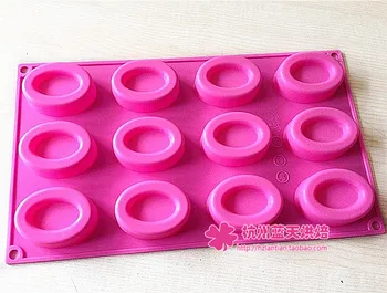 

Wholesale ,free shipping ,Silicone 12 hole oval Schocolate Mould pudding Mold