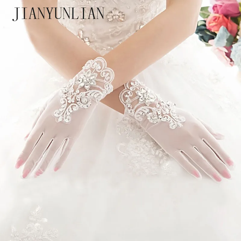 Luvas Para Noiva Для женщин элегантные свадебные перчатки Короткие Тюль 2018 слоновая кость Кристалл Свадебные кружева перчатки