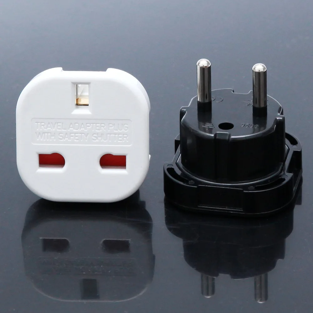 

European regulation to the British power conversion plug two round feet European regulation British standard power conversion
