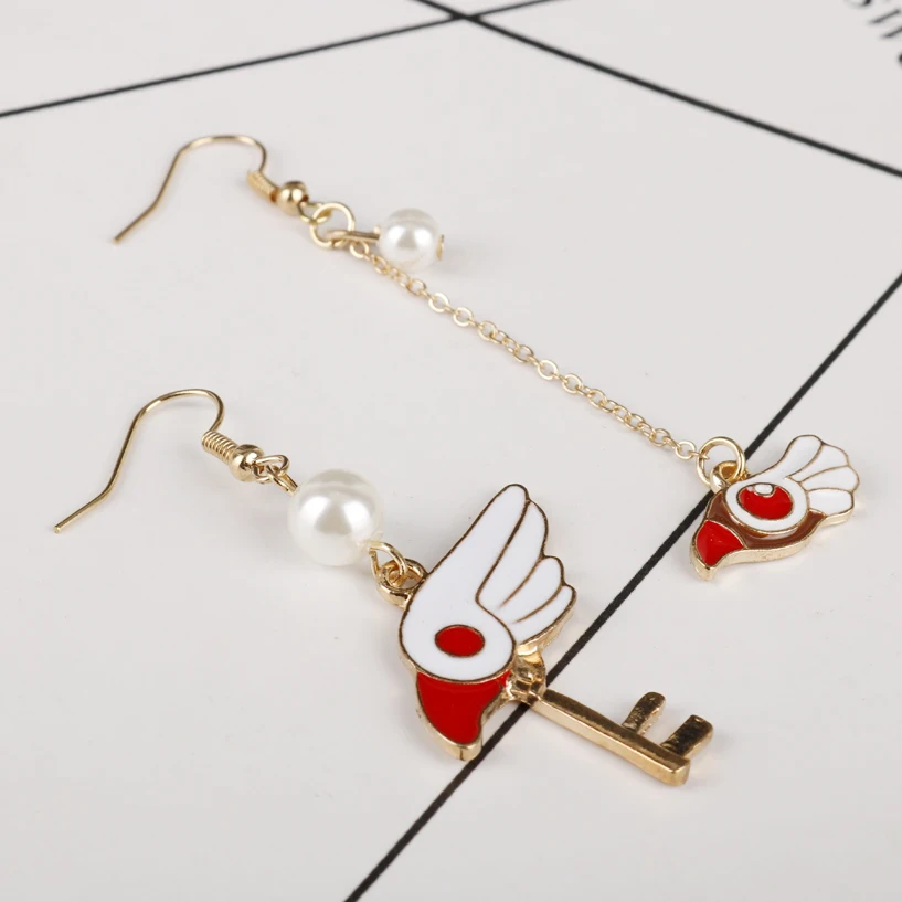 

MQCHUN Anime Card Captor Sakura Kinomoto Sealing Wand Key Dangle Drop Earrings Cosplay Cardcaptor Sakura Star Wings Long Earring