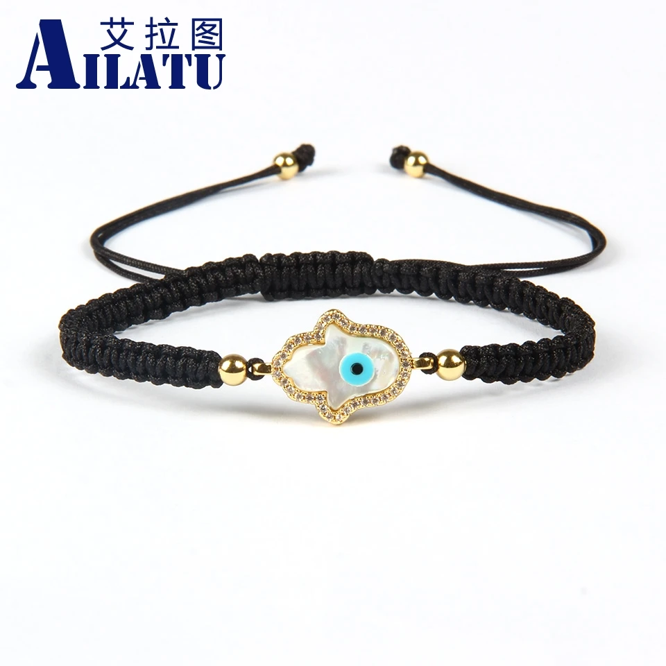 

Ailatu Brand Religious Symbols Micro Paved Blue Cz Eye Fatima Hand Hamsa and Shell Turkish Lucky Eye Macrame Bracelet