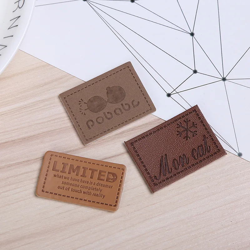 2019 factory professional custom embossed clothing pu genuine faux