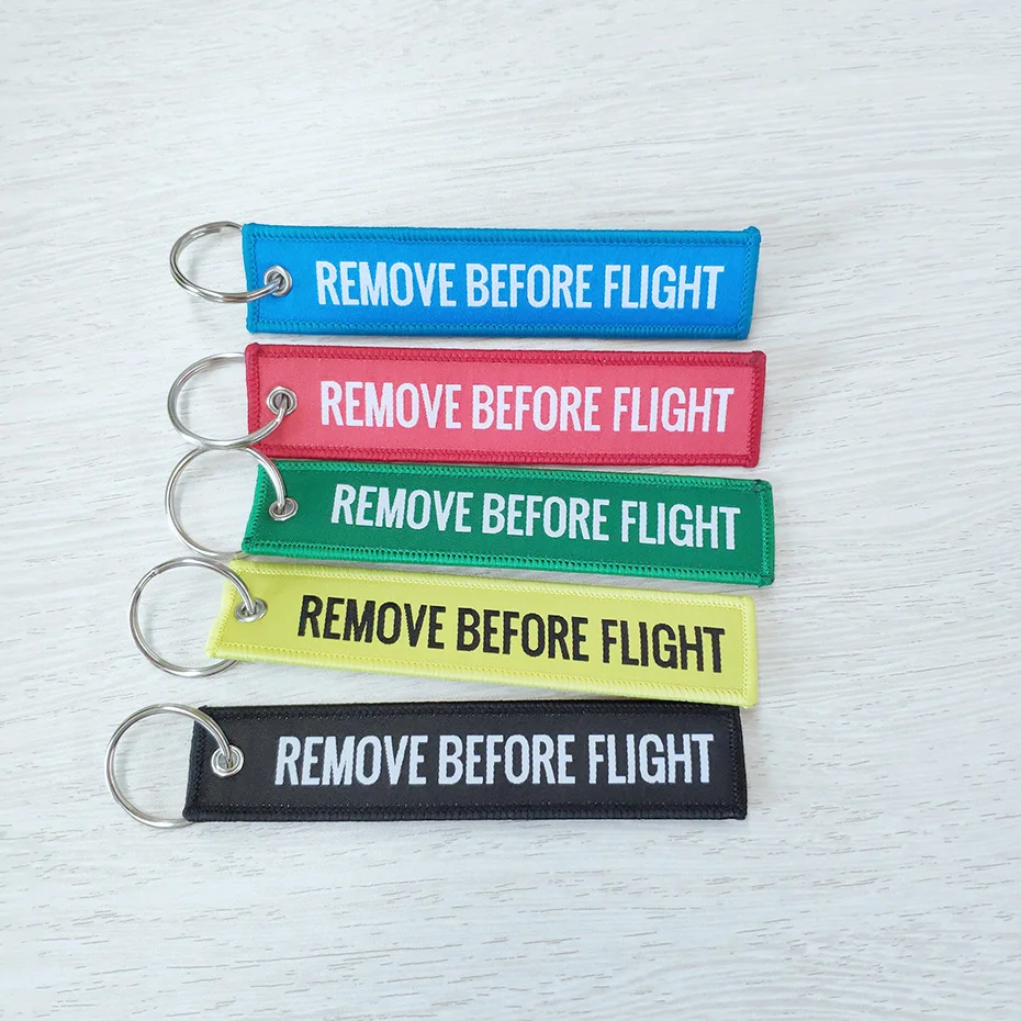 

Remove Before Flight Key Chain Trendy Keyring Embroidery Polyester Fabric Key Protector Commemorative Keychain Buckle SP0978