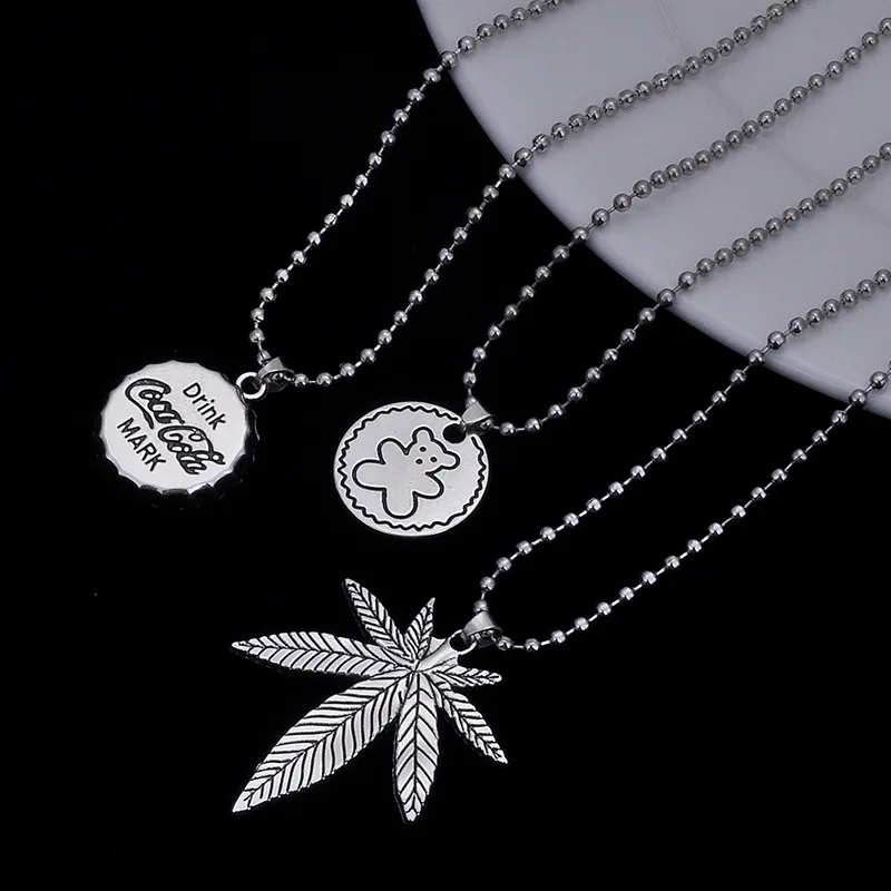 

New retro letter Coke bottle cap pendant necklace maple leaf pendant bear necklace hip hop fashion unisex necklace pendant jewel