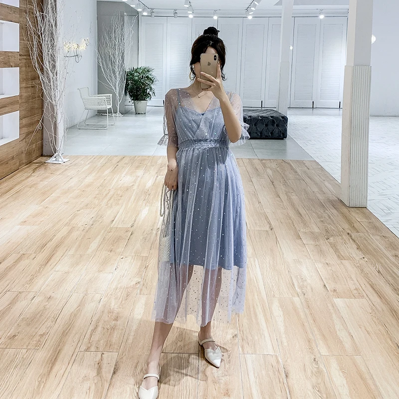 

Maternity dress summer new 2019 Korean version of the short-sleeved sequins mesh waist was thin in the long dress