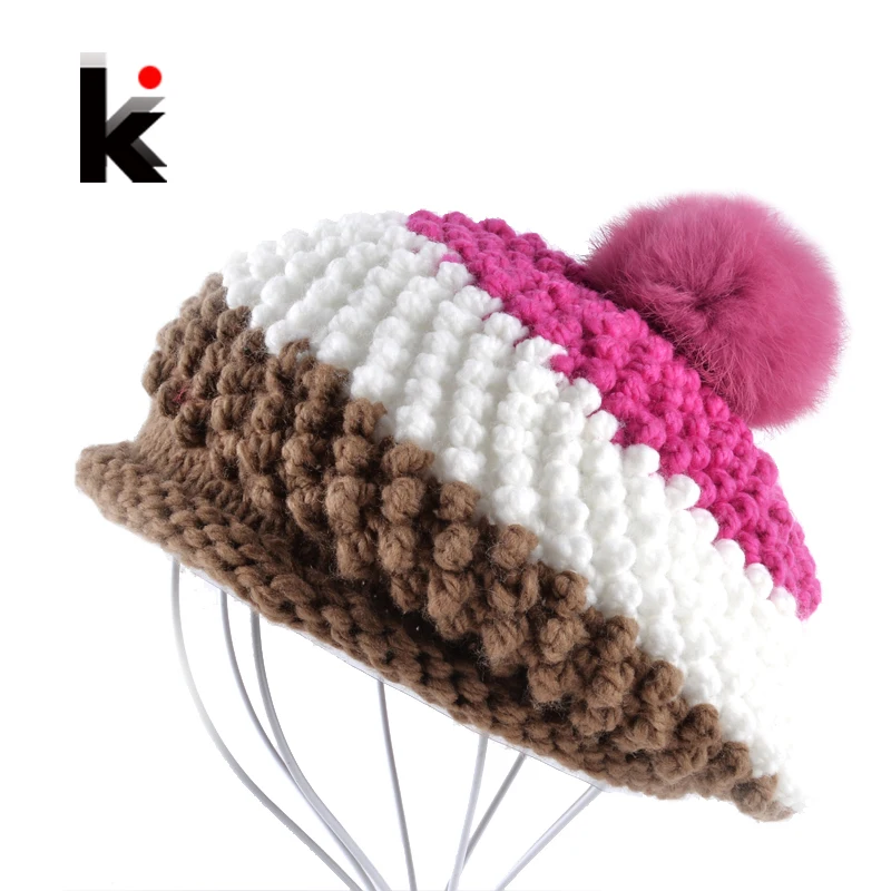 flat cap with pom pom