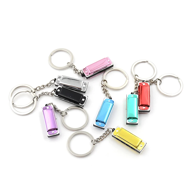 

Kid Harmonica Toy Gift Mini 4 Holes 8 Tone Harmonica Keychain Key Newest
