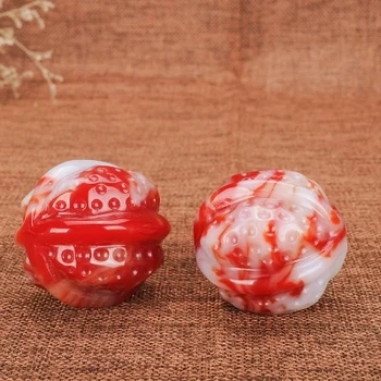 

Xinjiang Hetian jade chicken blood stone walnut handlebar