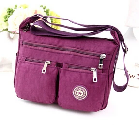 

The new European and American fashion Shoulder Messenger canvas bag lightweight waterproof nylon oxford cloth travel bag