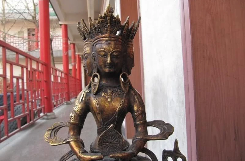 

Fane classical Bronze Three Face Guan Yin Bodhisattva Hold wheel Buddha Statue