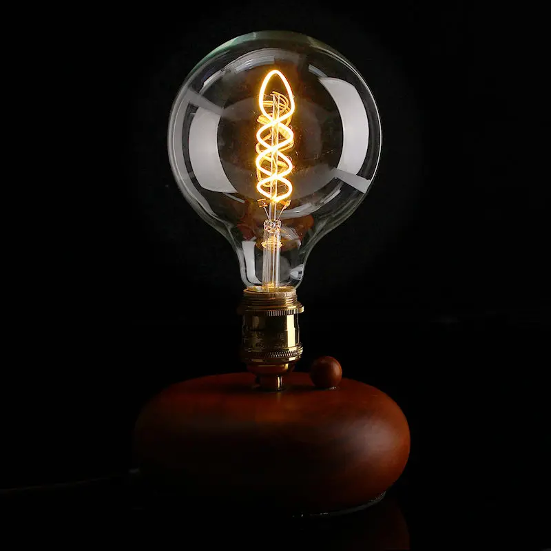 электрическая лампа накаливания. первая лампа накаливания. томас эдисон электрическая лампочка. электрическая лампочка эдисона 1879. томас эдисон лампа накаливания.