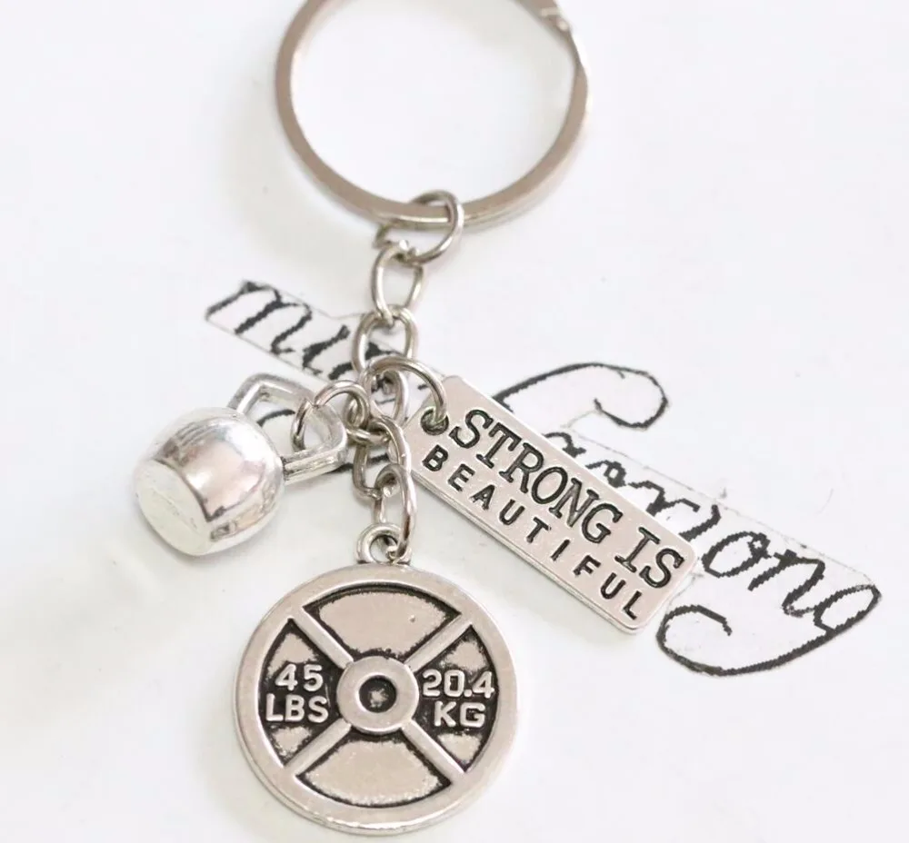 

NEW 1pcs Retro silver45LBS Dumbbell and English tag pendant Key chain