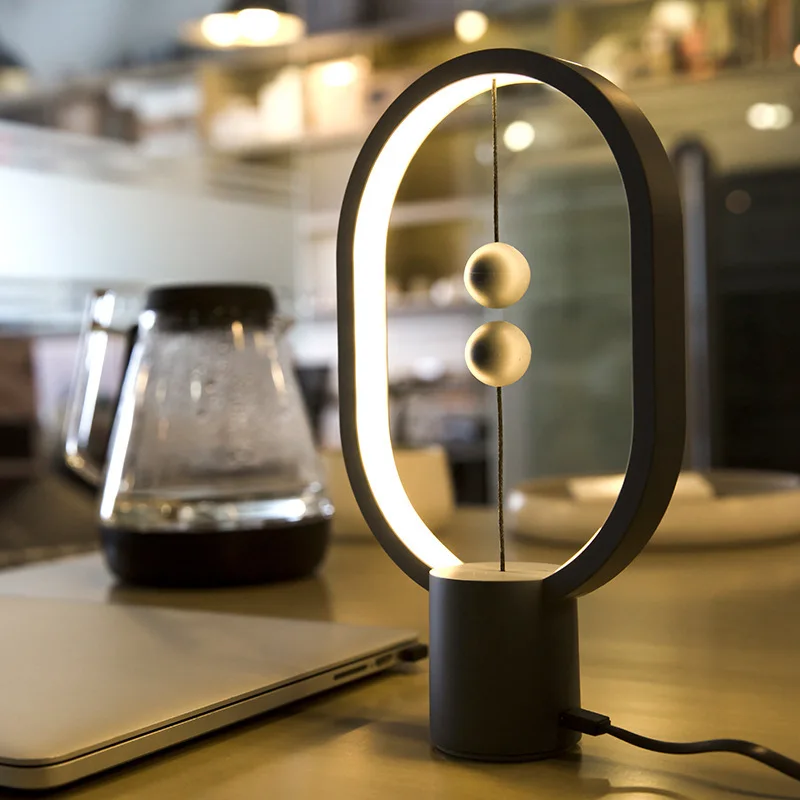 

Dropshipping DC5V 5W 48LED Heng Balance LED Table Lamp Ellipse Magnetic Mid-air Switch USB Powered Warm White Night Light