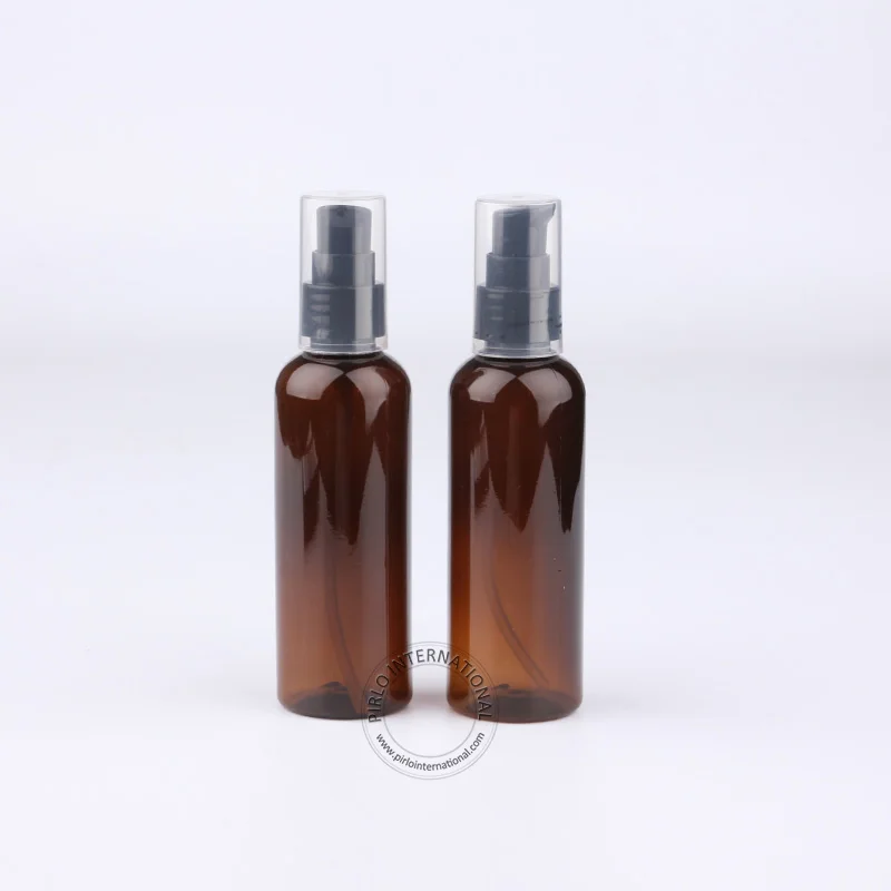 

30pcs/Lot Wholesale Empty 100ml Amber Plastic Lotion Bottle 100g PET Shampoo Container With Pump Refillable Black Lid Packaging
