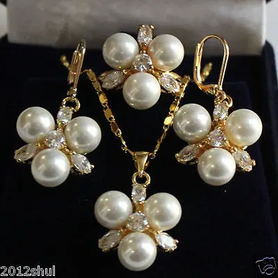 

Free Shipping>>new hot 8mm South Sea Shell Pearl Round Beads Earrings Ring Pendant Necklace Set